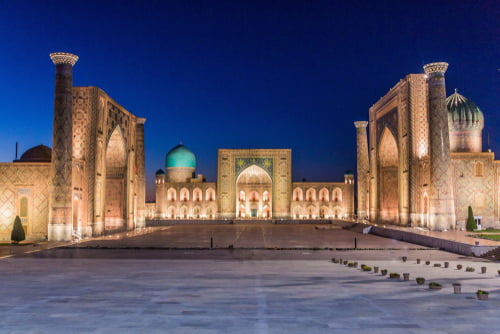 Registan Square illuminated at night in Uzbekistan