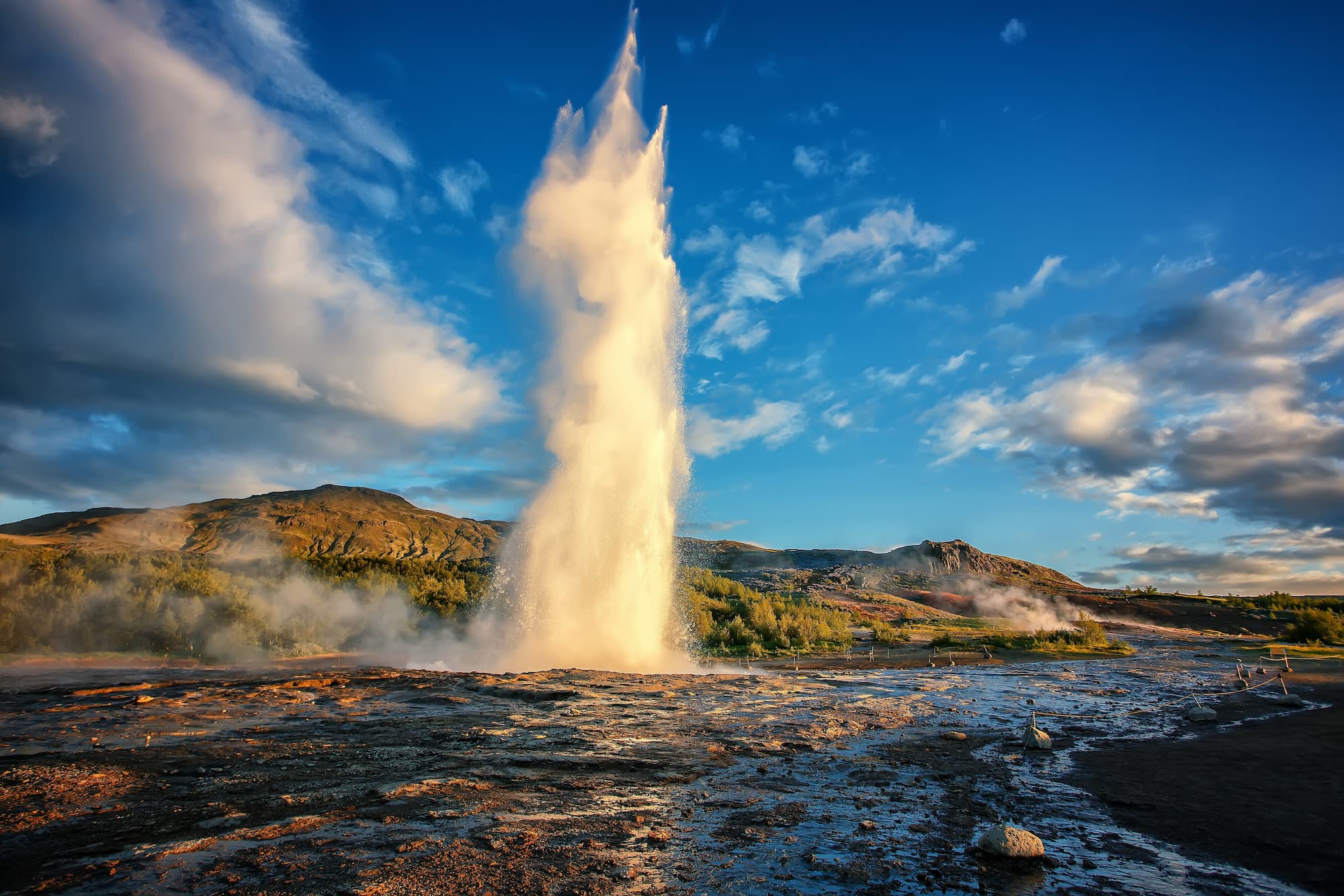 Impressive Eruption of Strokkur Geysir in Iceland during sunset. Strokkur Geyser Is one most popular nature landmark and travel destination Golden circle, Iceland